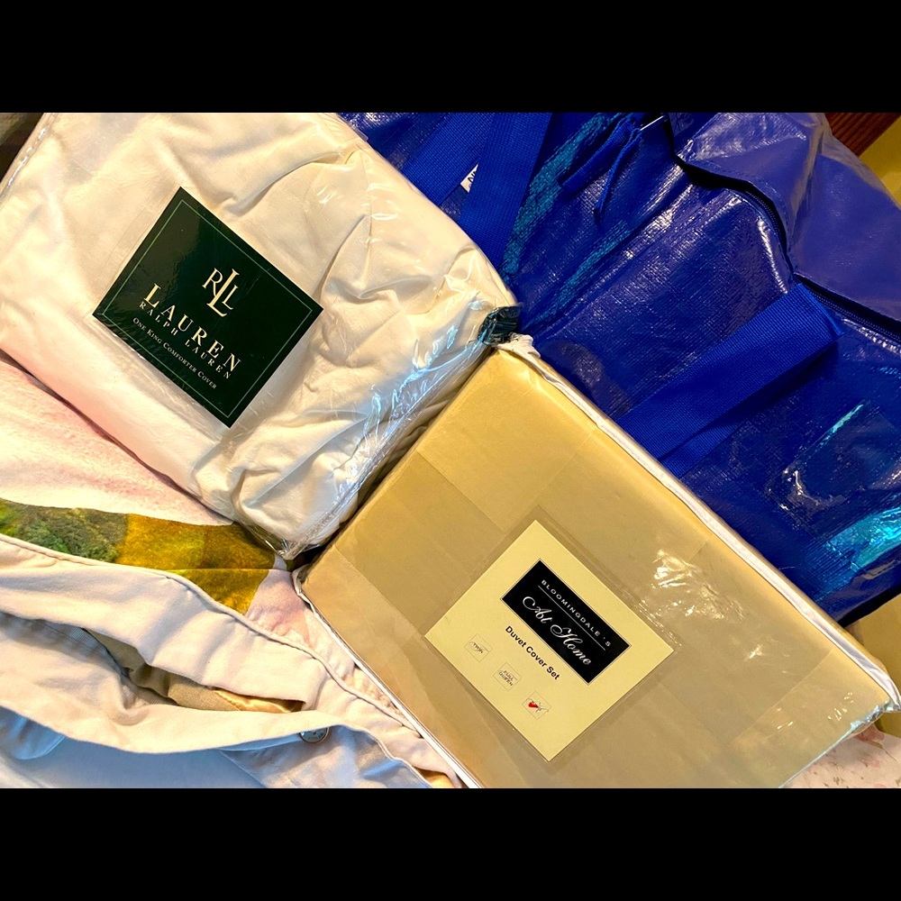 2 brand New King size duvet covers original packaging one is white, another tan.
